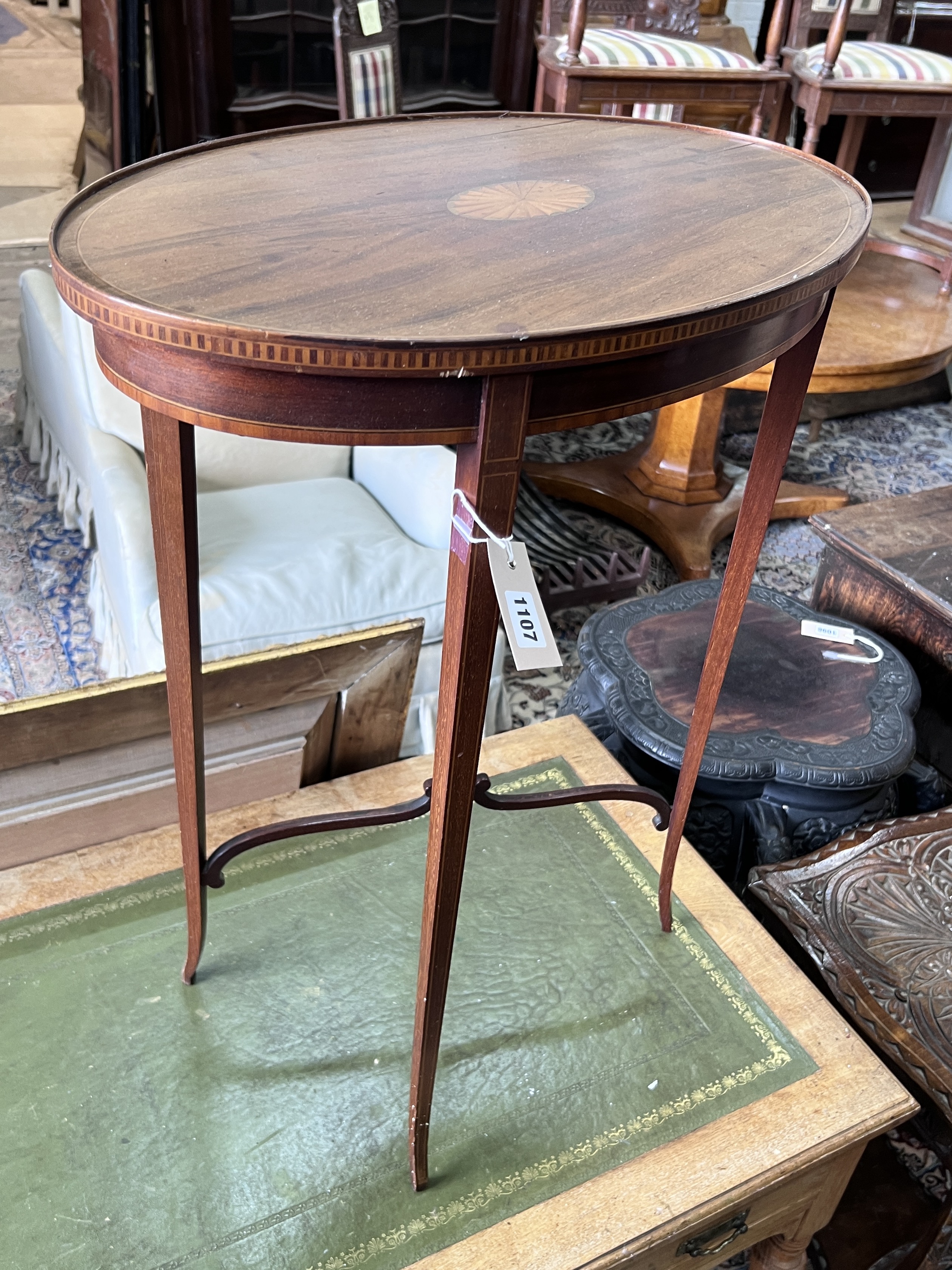 An Edwardian oval inlaid mahogany occasional table, width 61cm, depth 38cm, height 71cm